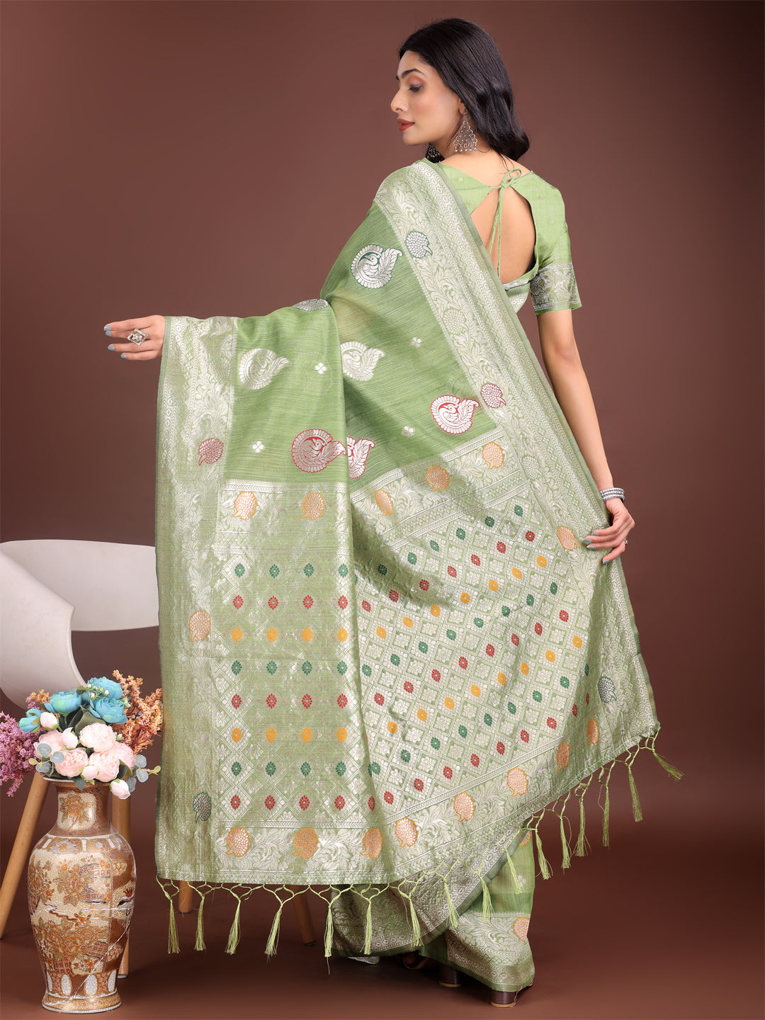 Astita Elegant Light Green Linen Cotton Saree with Zari Border & Woven Motifs – Perfect for Sophisticated Everyday & Festive Looks