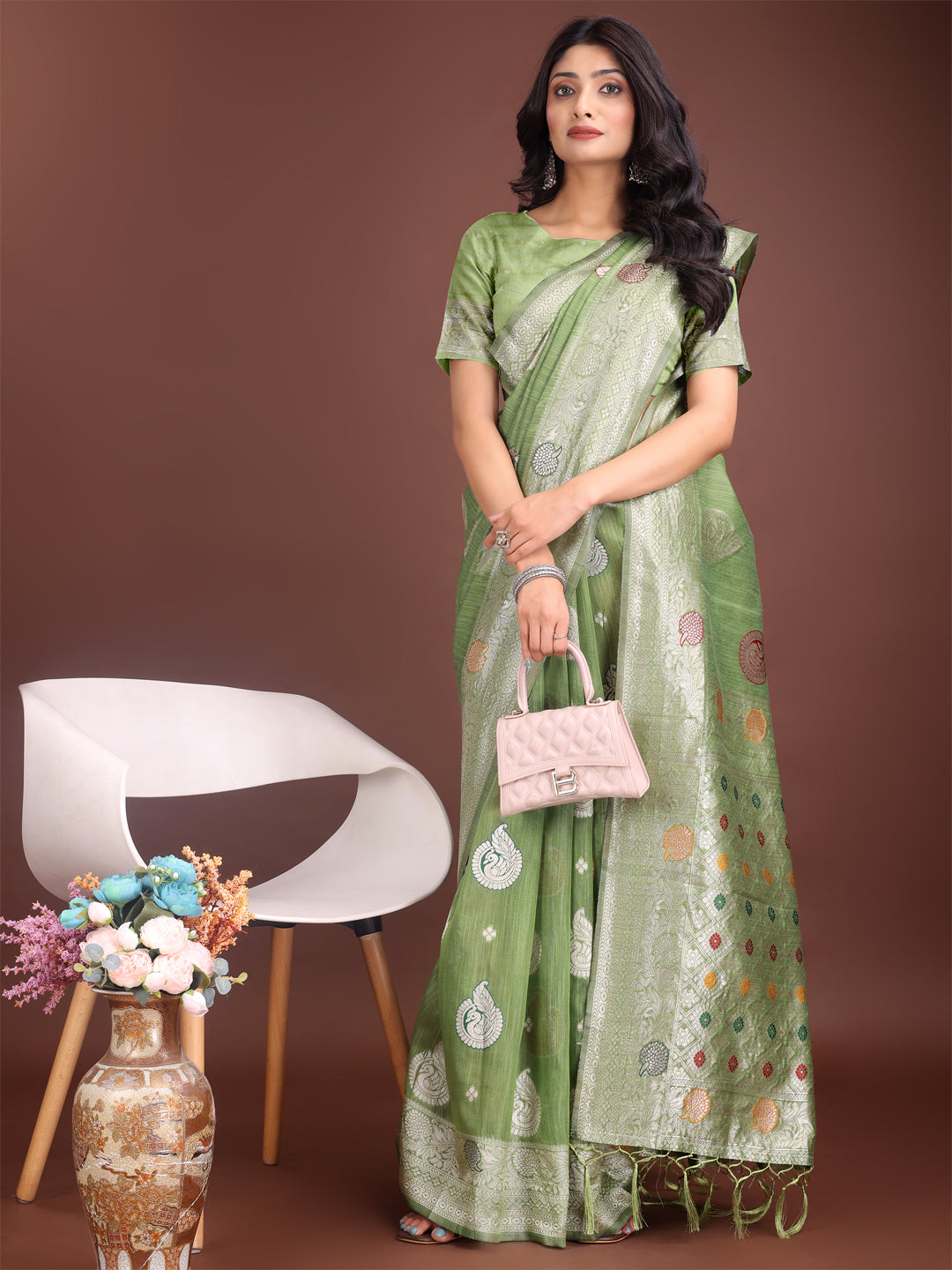 Astita Elegant Light Green Linen Cotton Saree with Zari Border & Woven Motifs – Perfect for Sophisticated Everyday & Festive Looks