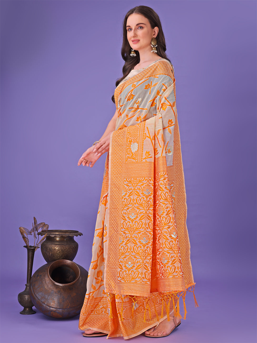 Astita Orange Lichi Silk Saree with Floral Weaving & Tassel Pallu – Elegant Festive & Party Wear Saree