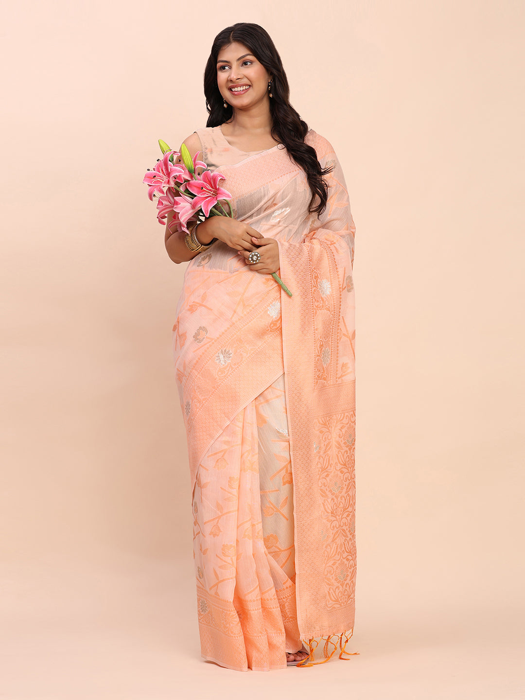 Astita Beige & Peach Banarasi Cotton Saree with Floral Zari Work and Traditional Pallu – Elegant Ethnic Wear for Festivals & Ceremonies