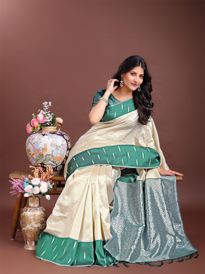 Astita Cream & Green Lichi Silk Saree with Rich Zari Pallu & Tassels – Soft Festive Wear Saree for Women
