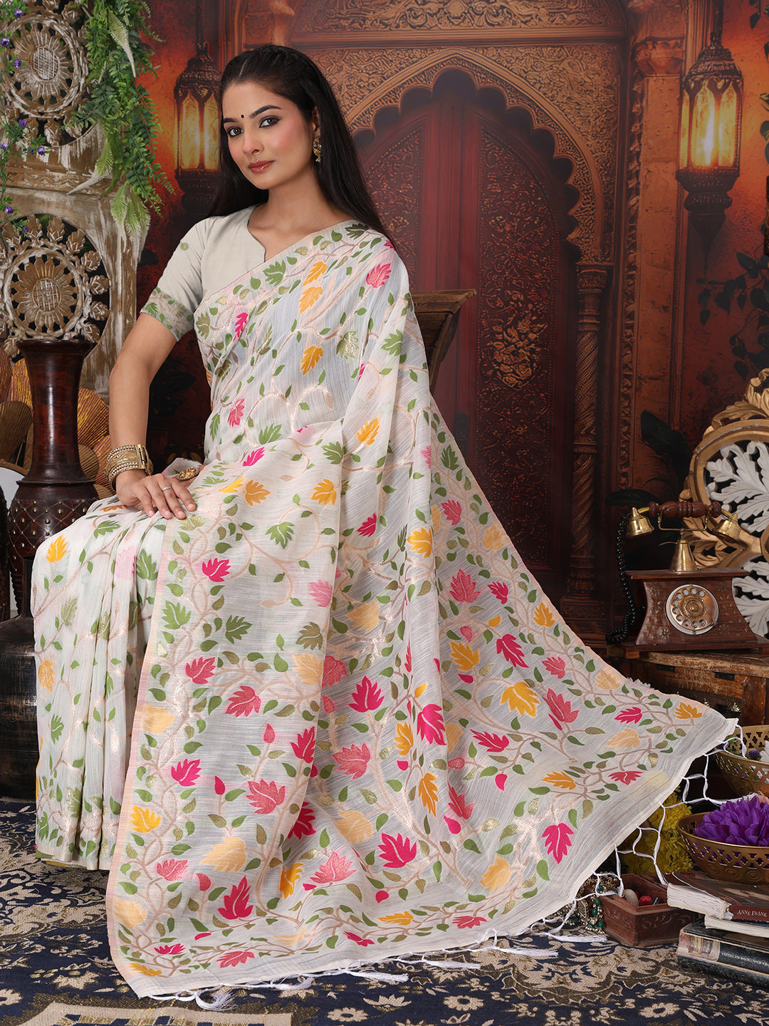 Astita White Floral Linen Cotton Saree with Zari Detailing & Printed Pallu Saree