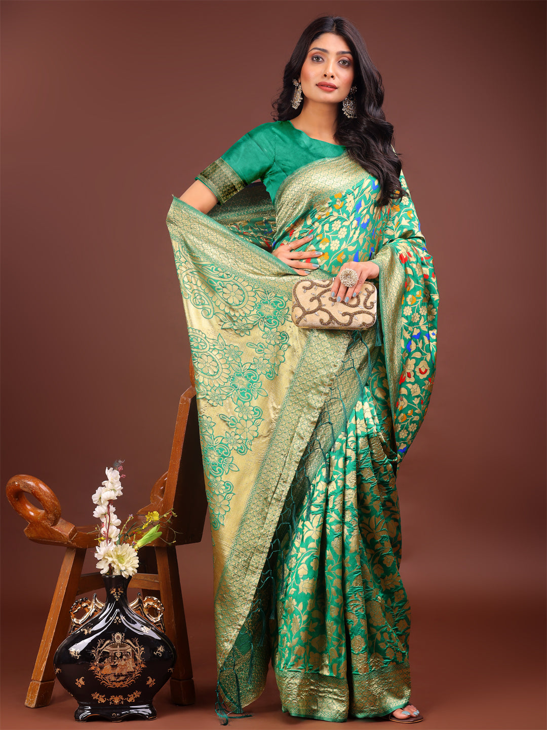 Astita Majestic Green Silk Saree with Gold Zari & Floral Design – Perfect for Festive & Traditional Occasions