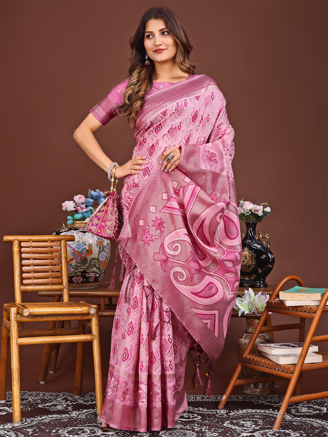 Astita Grace in Every Thread: Pink Patola Linen Cotton Saree Woven with Cultural Elegance