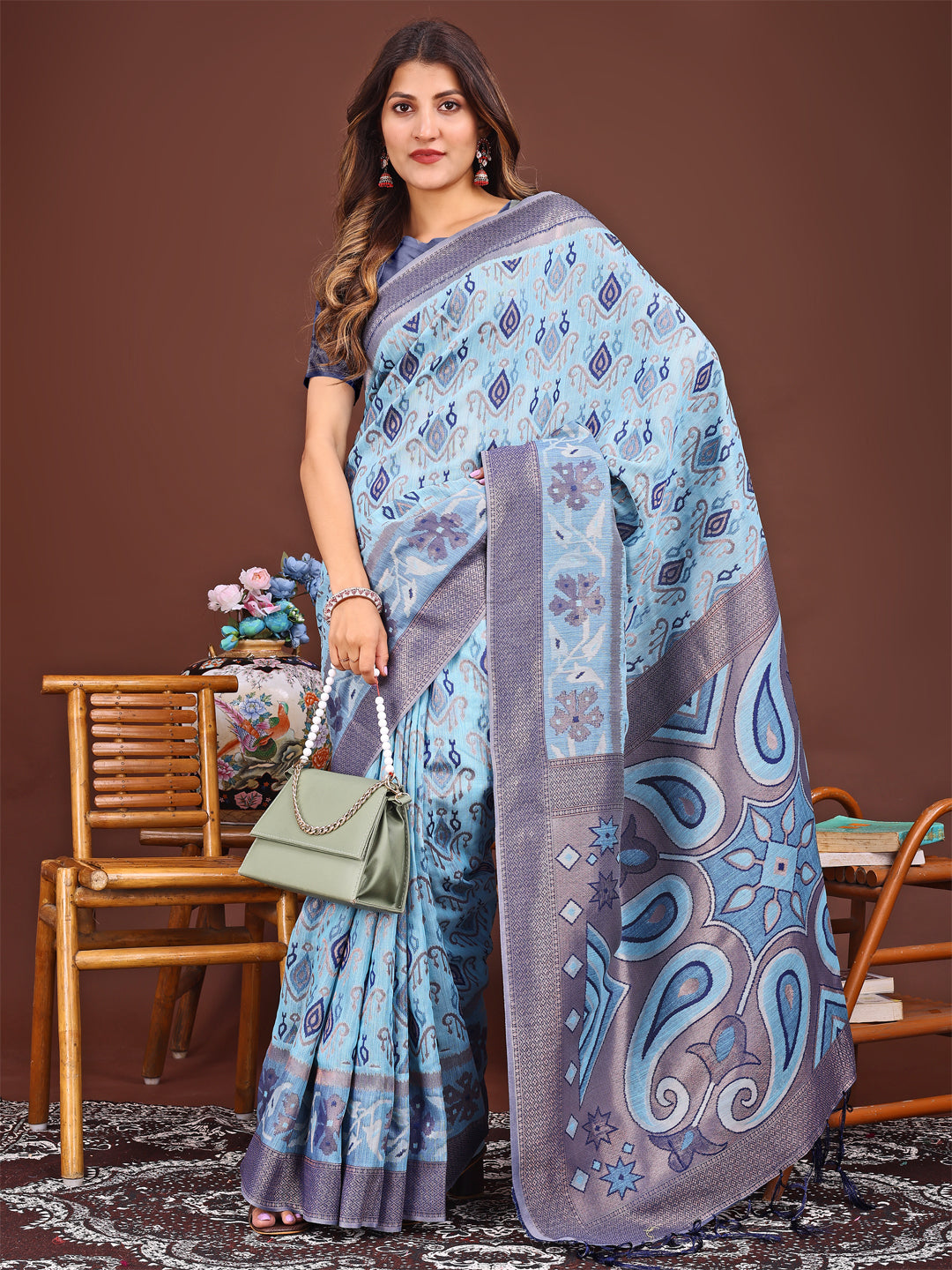 Astita Grace in Every Thread: Sky Blue Patola Linen Cotton Saree Woven with Cultural Elegance
