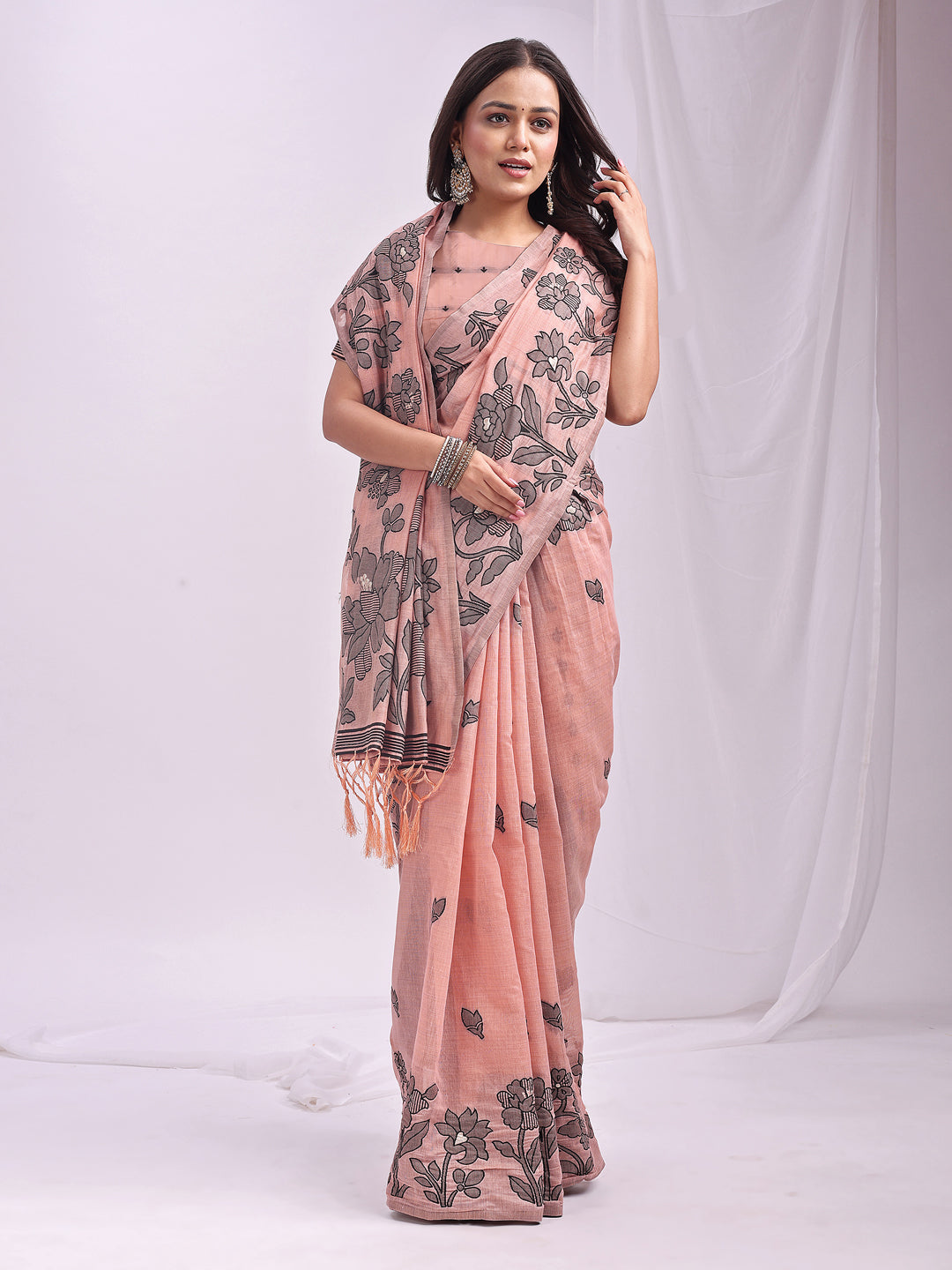 Astita Peach Linen Cotton Saree with Elegant Black Floral Print – Lightweight & Stylish Saree for Festive and Office Wear