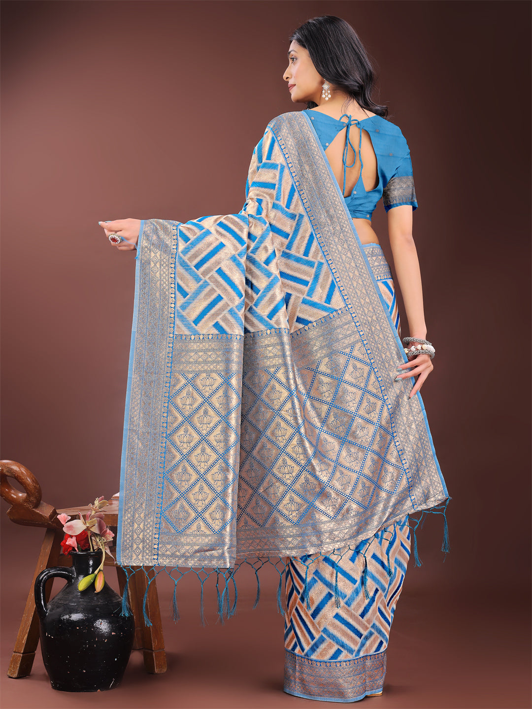 Astita Elegant Sky Blue & Cream Linen Saree with Geometric Design and Zari Border – Festive & Party Wear