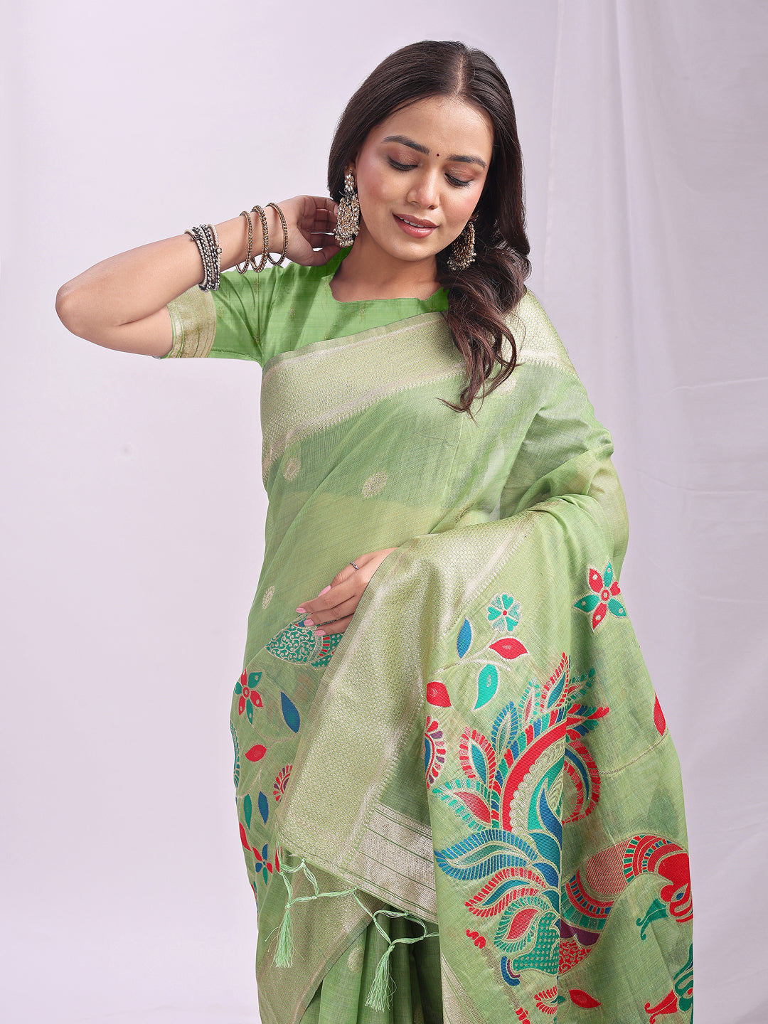 Astita Light Green Linen Cotton Saree with Bold Peacock Pallu – Elegant Zari Border Saree for Festive & Party Wear | Lightweight & Soft Fabric