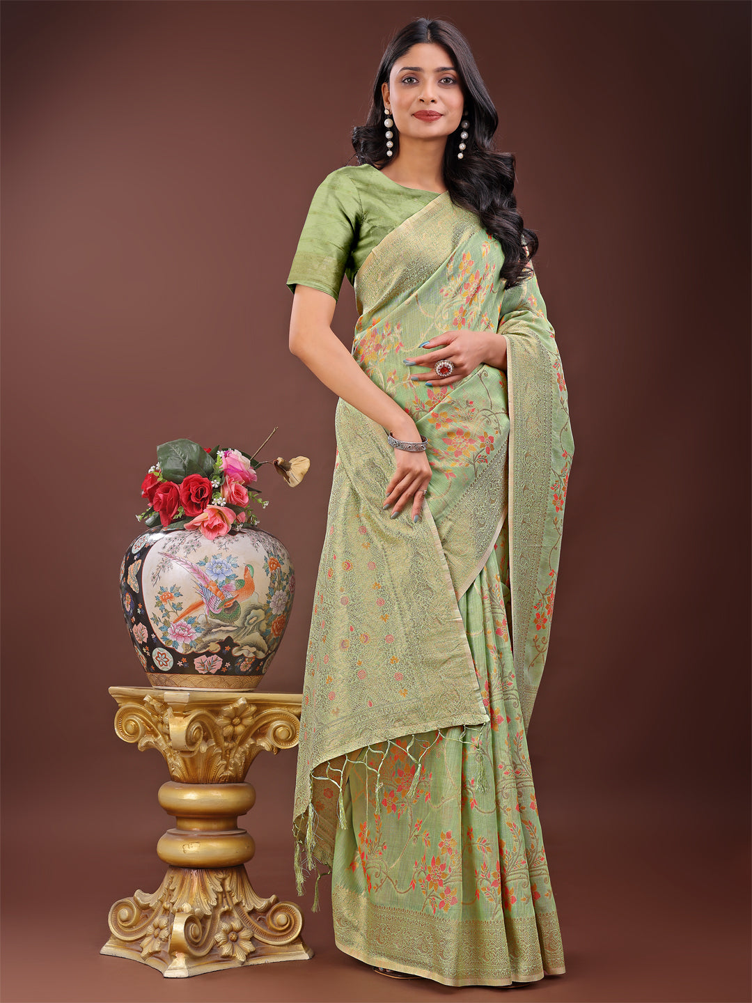 Astita Elegant Light Green Linen Cotton Saree with Floral Weave & Soft Gold Pallu – Graceful Choice for Casual, Office & Festive Looks