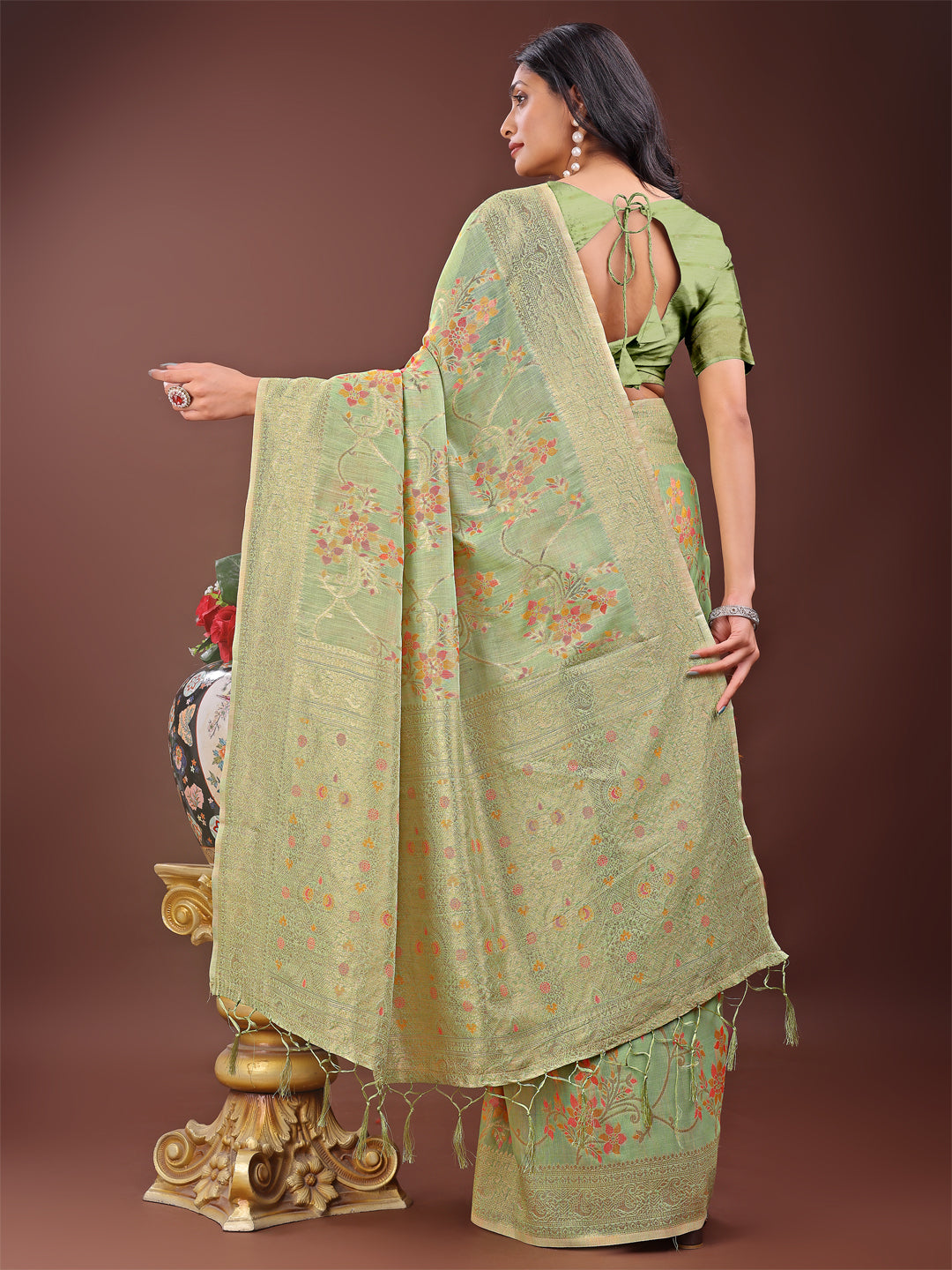 Astita Elegant Light Green Linen Cotton Saree with Floral Weave & Soft Gold Pallu – Graceful Choice for Casual, Office & Festive Looks