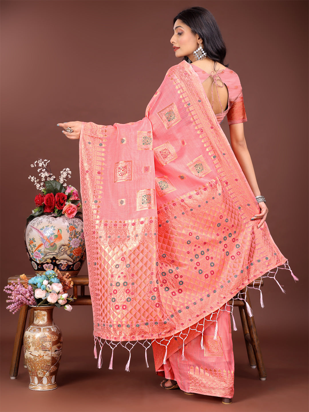Astita Elegant Peach Linen Saree with Intricate Woven Patterns – Lightweight Grace for Everyday and Festive Moments