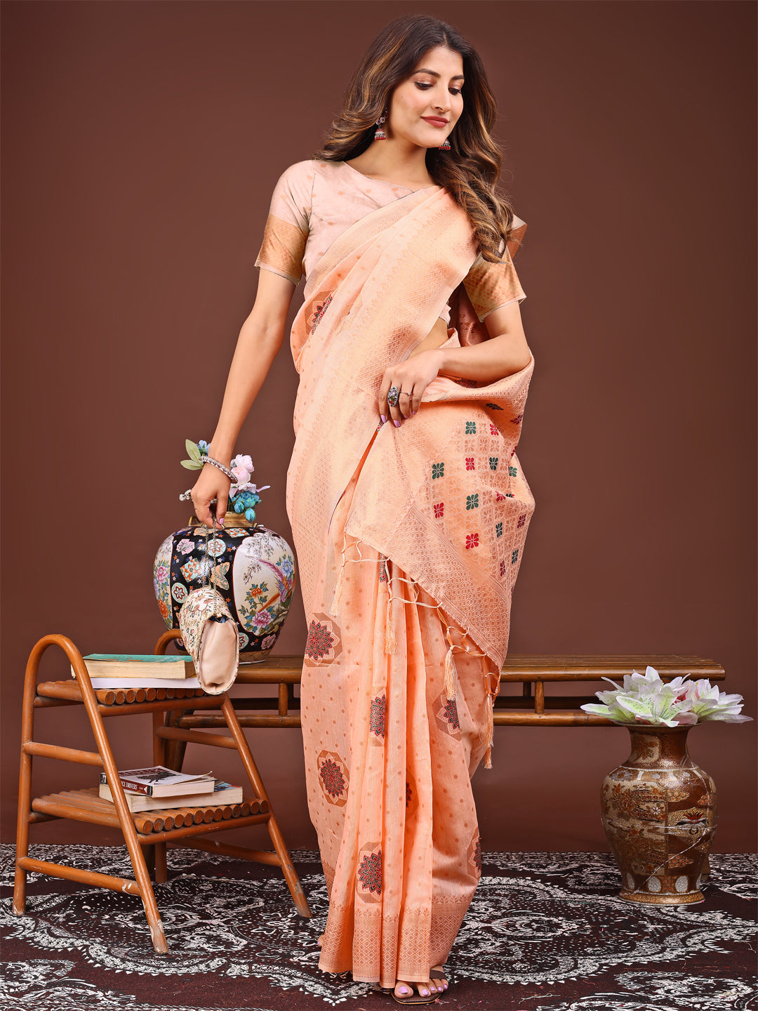 Astita Elegance Draped in Threads: Orange Linen Cotton Saree Woven with Serene Charm