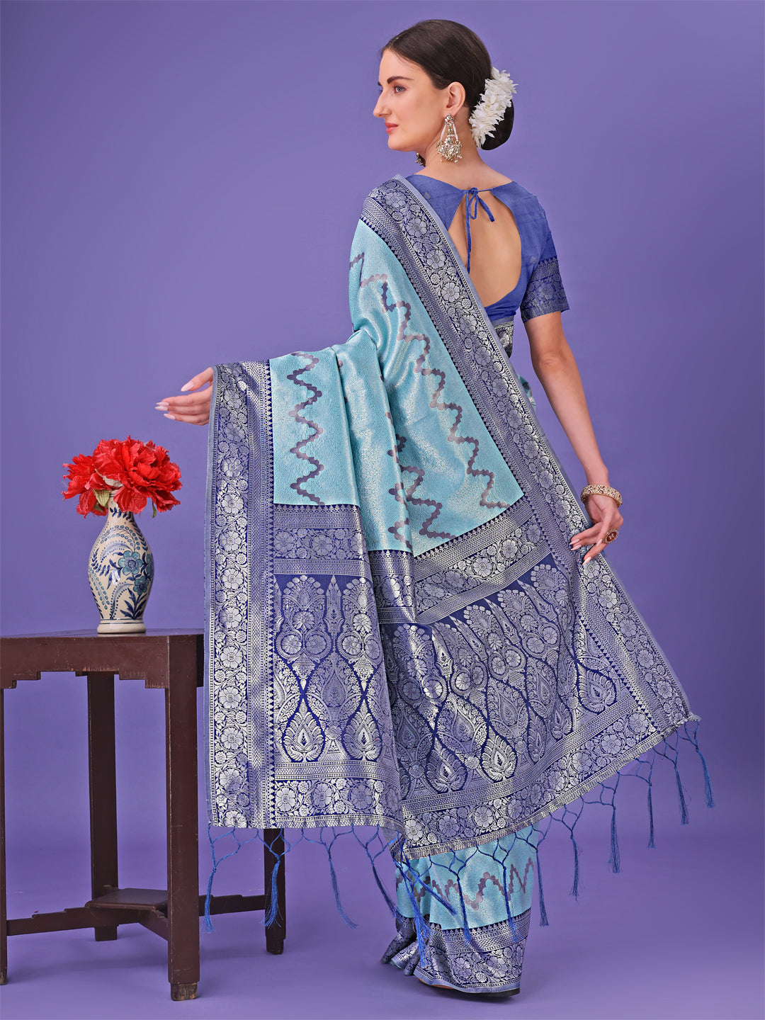 Astita Sky Blue & Green Lichi Silk Saree with Rich Woven Border and Zigzag Pattern – Wedding & Festive Wear