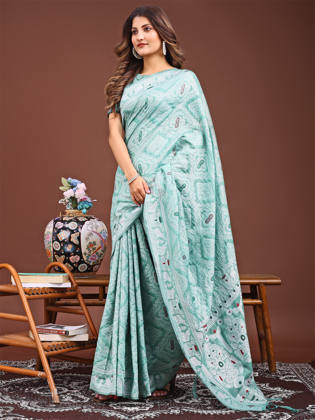 Graceful Sea Green Printed Saree – A Symphony of Culture and Feminine Charm