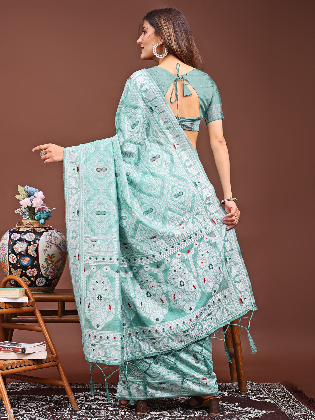 Graceful Sea Green Printed Saree – A Symphony of Culture and Feminine Charm