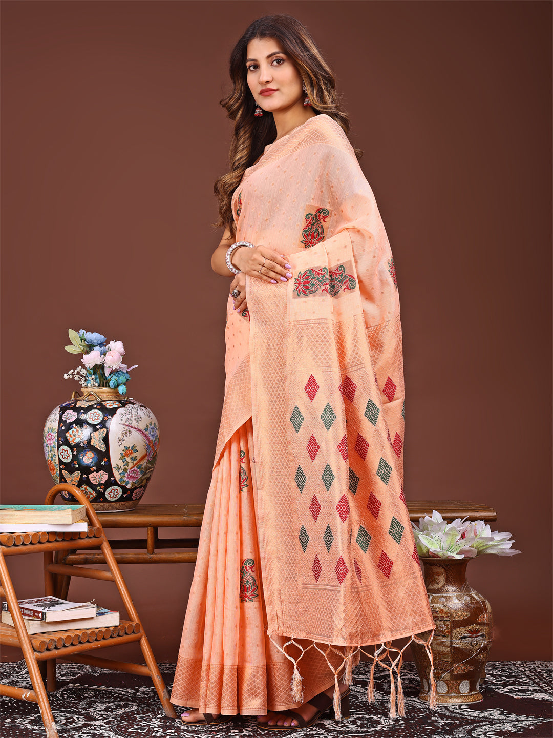 Astita Orange Jaquard Saree with Tassels – Radiate Soft Elegance and Timeless Beauty