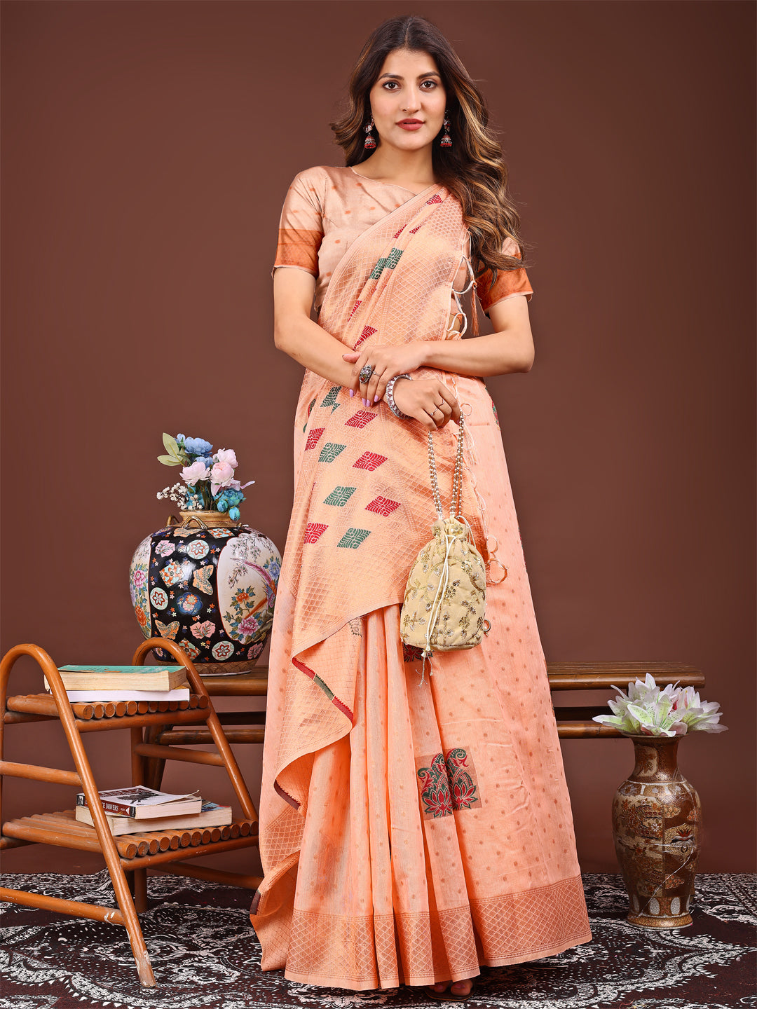 Astita Orange Jaquard Saree with Tassels – Radiate Soft Elegance and Timeless Beauty