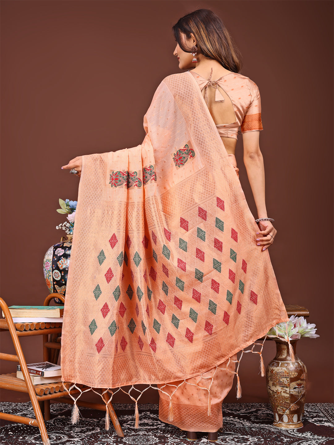 Astita Orange Jaquard Saree with Tassels – Radiate Soft Elegance and Timeless Beauty