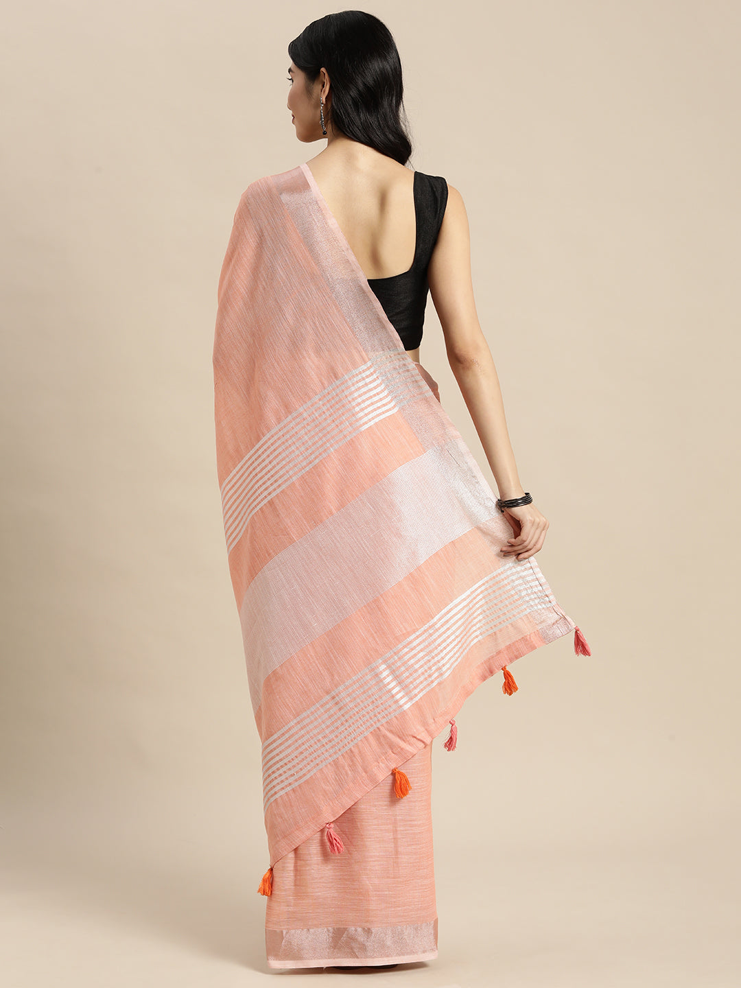 Peach Woven Linen Blend Saree with Silver Zari Border and Tassels
