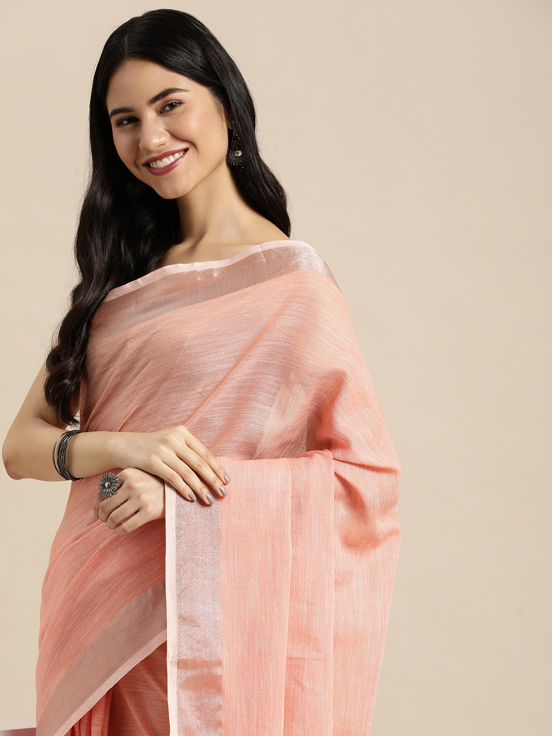 Peach Woven Linen Blend Saree with Silver Zari Border and Tassels