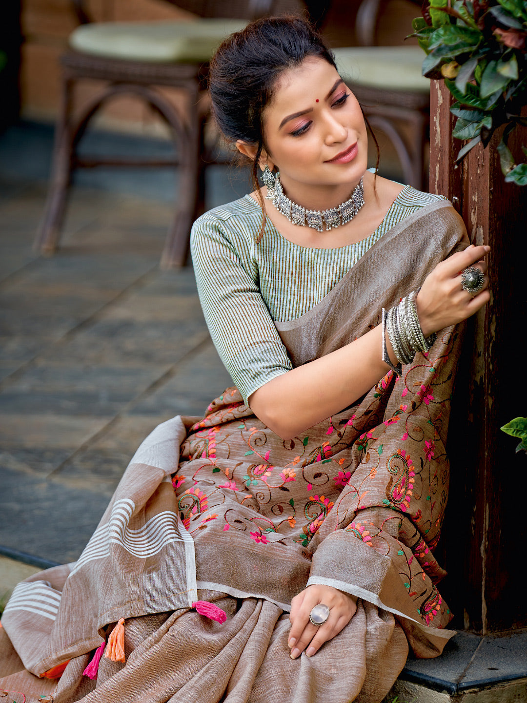 Astita Royal Brown Linen Cotton Saree with Vibrant Floral Zari Border | Premium Festive & Party Collection