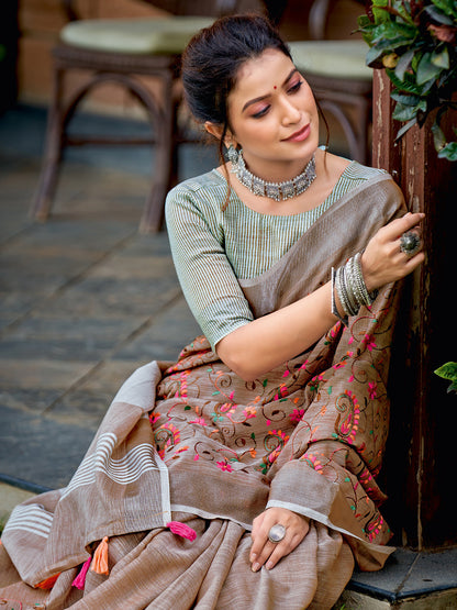 Astita Royal Brown Linen Cotton Saree with Vibrant Floral Zari Border | Premium Festive & Party Collection