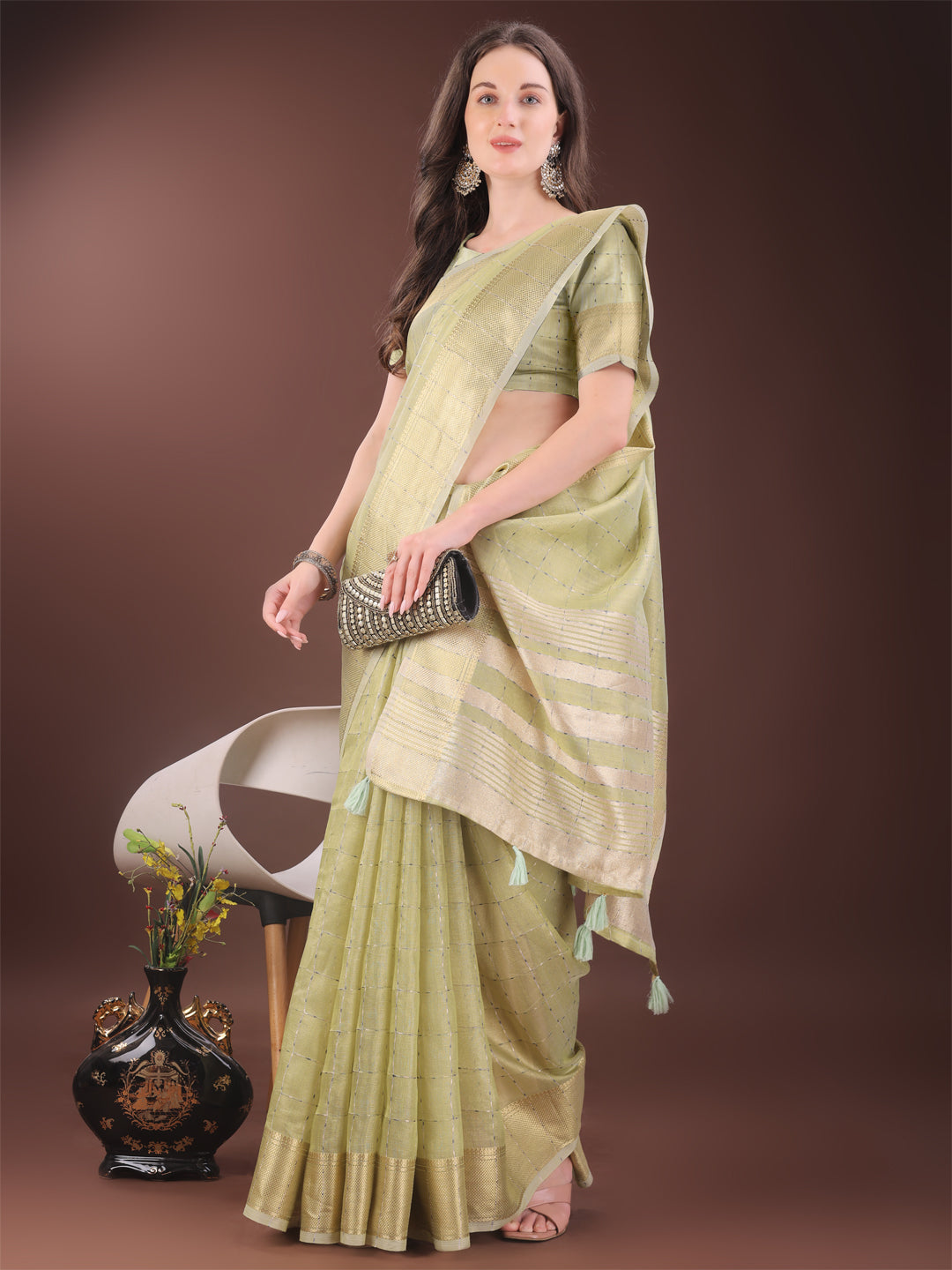 Astita Elegant Light Green Organza Saree with Golden Zari Border & Designer Tassels | Lightweight Partywear Saree