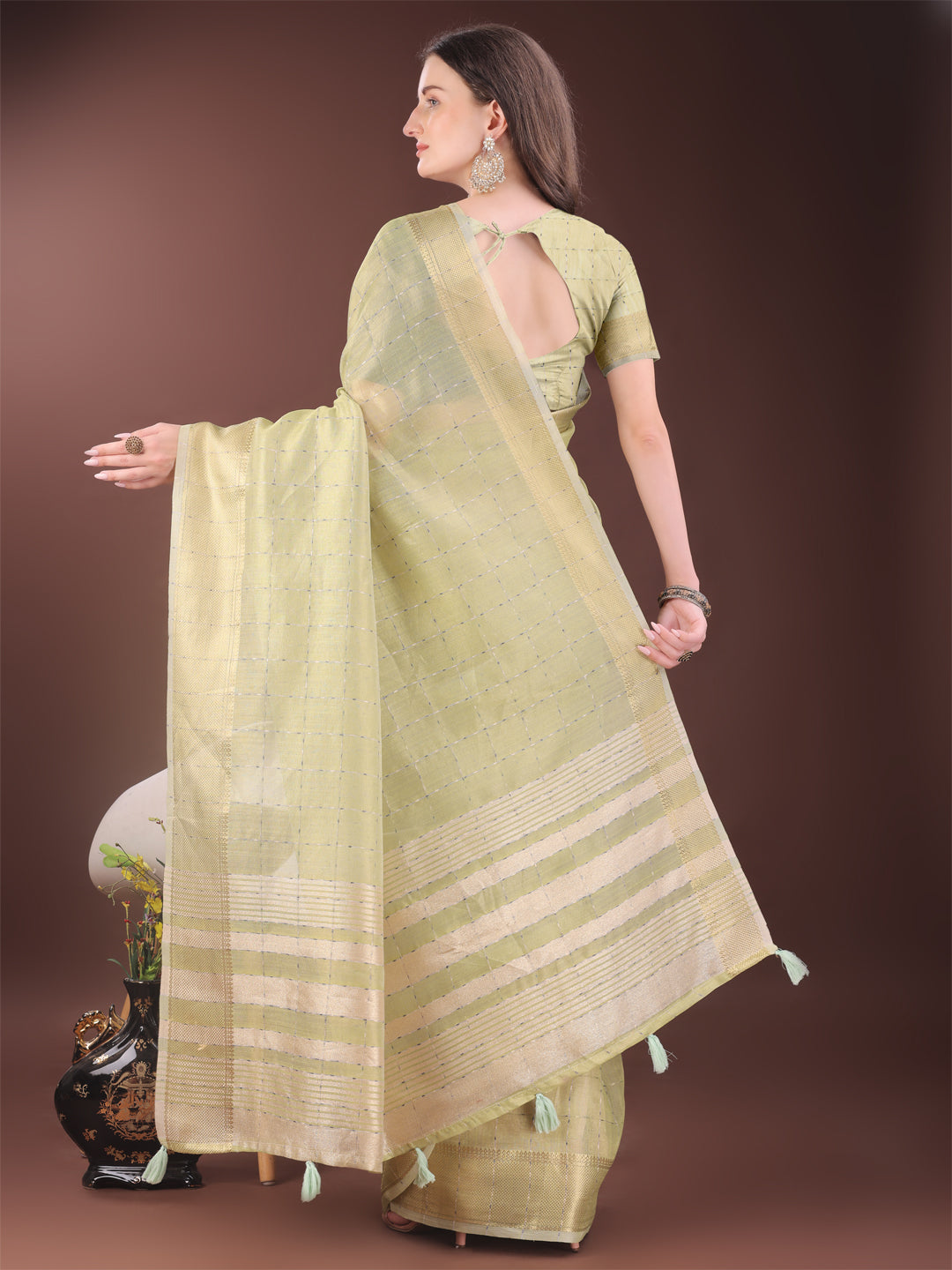Astita Elegant Light Green Organza Saree with Golden Zari Border & Designer Tassels | Lightweight Partywear Saree
