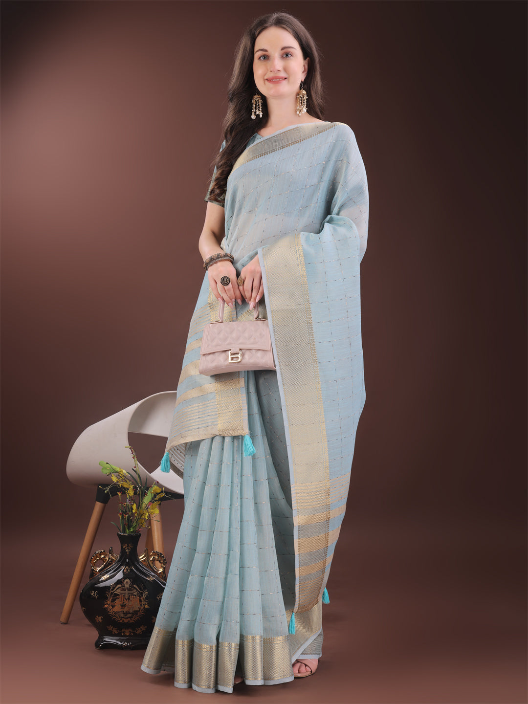 Astita Elegant Sky Blue Organza Saree with Golden Zari Border & Designer Tassels | Lightweight Partywear Saree