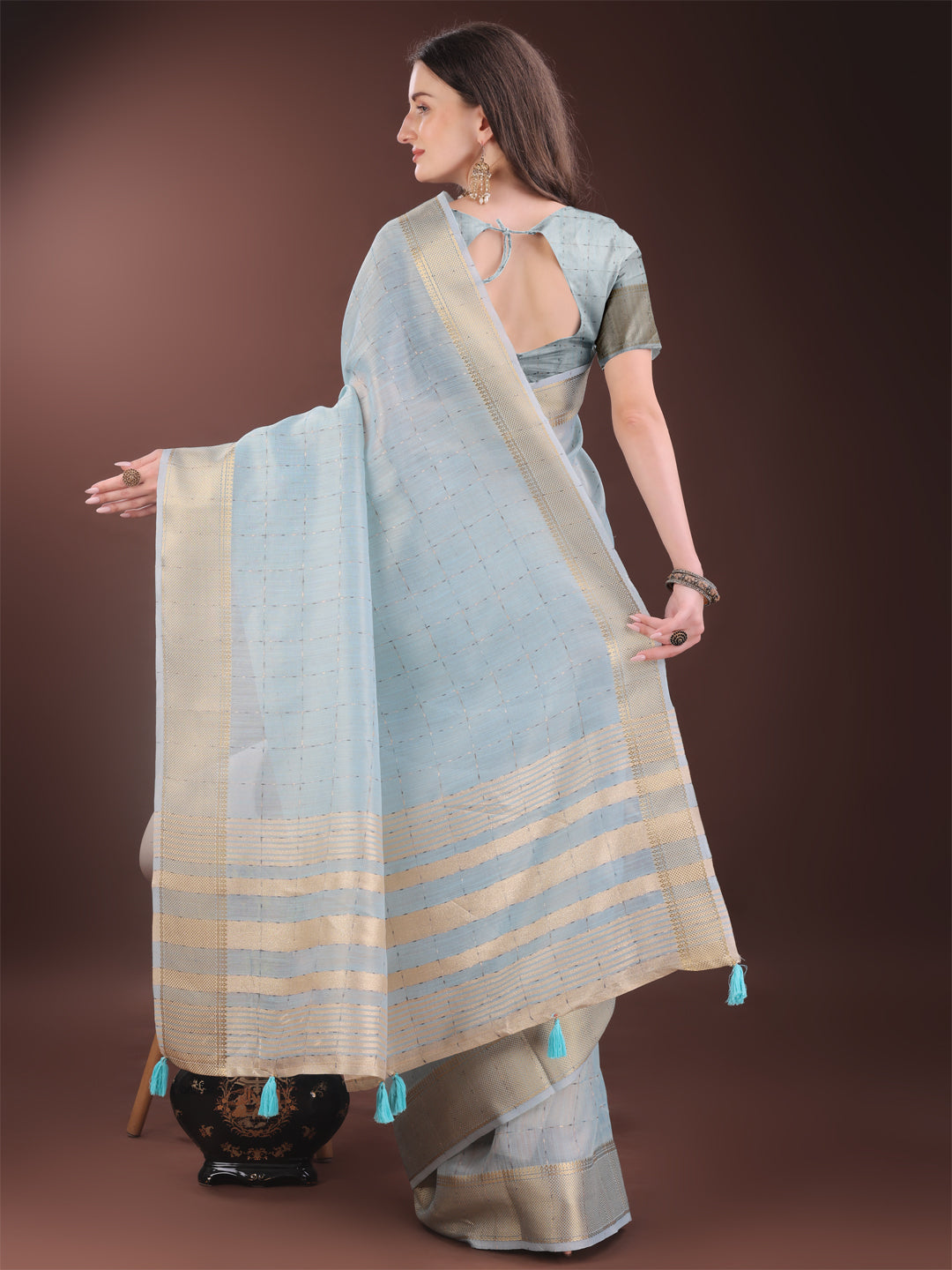 Astita Elegant Sky Blue Organza Saree with Golden Zari Border & Designer Tassels | Lightweight Partywear Saree