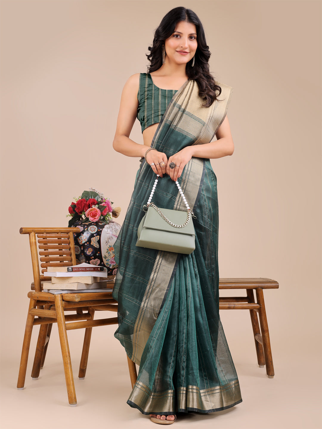 Dark Green Organza Saree with Golden Border – Bold Elegance in Every Drape