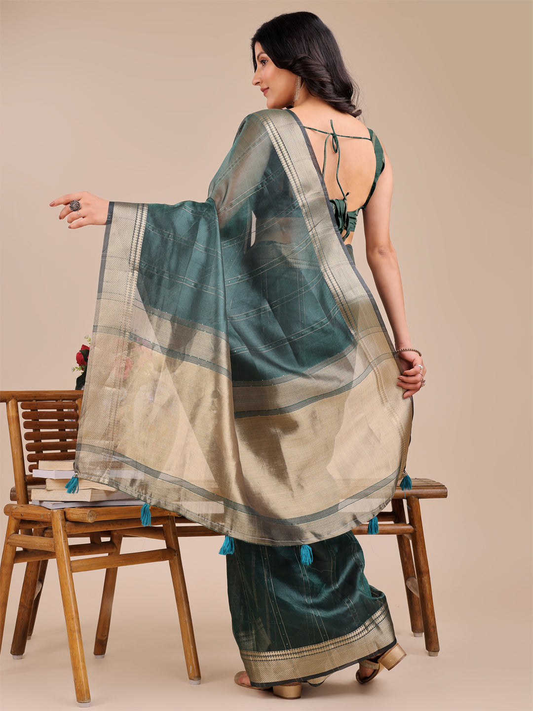Dark Green Organza Saree with Golden Border – Bold Elegance in Every Drape