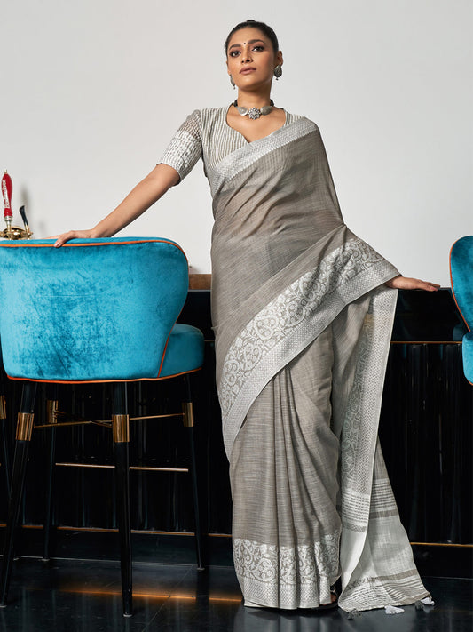 Astita Elegant Grey Woven Linen Saree with Contrast Zari Border & Tassels – Soft & Breathable Party Wear