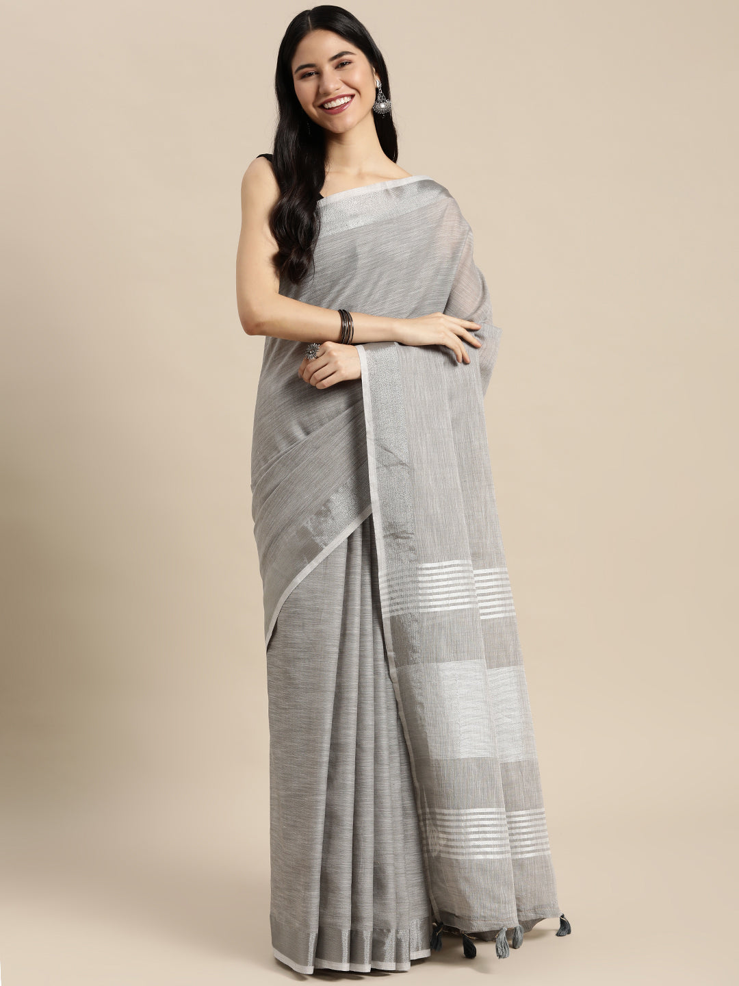 Astita Elegant Light Grey Woven Linen Saree with Contrast Zari Border & Tassels – Soft & Breathable Party Wear