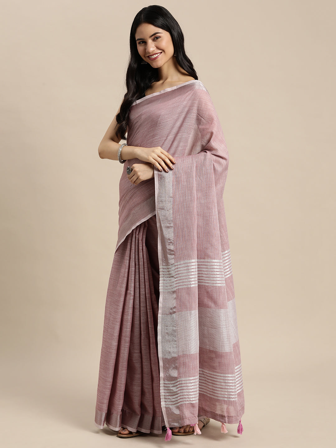 Astita Elegant Mauve Woven Linen Saree with Contrast Zari Border & Tassels – Soft & Breathable Party Wear