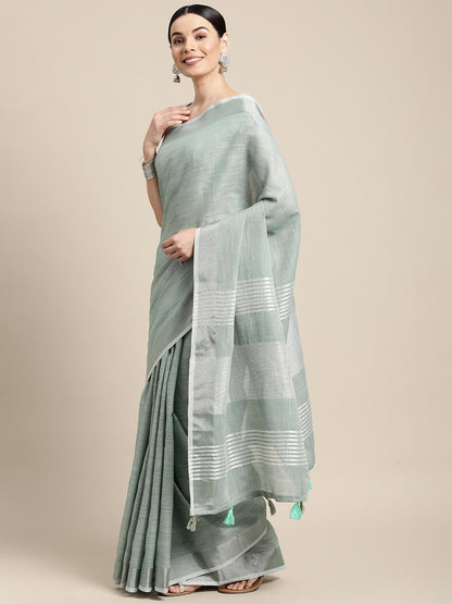 Elegant Sea Green Woven Linen Saree with Contrast Zari Border & Tassels – Soft & Breathable Party Wear