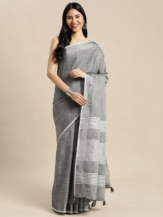 Astita Elegant Dark Grey Woven Linen Saree with Contrast Zari Border & Tassels – Soft & Breathable Party Wear