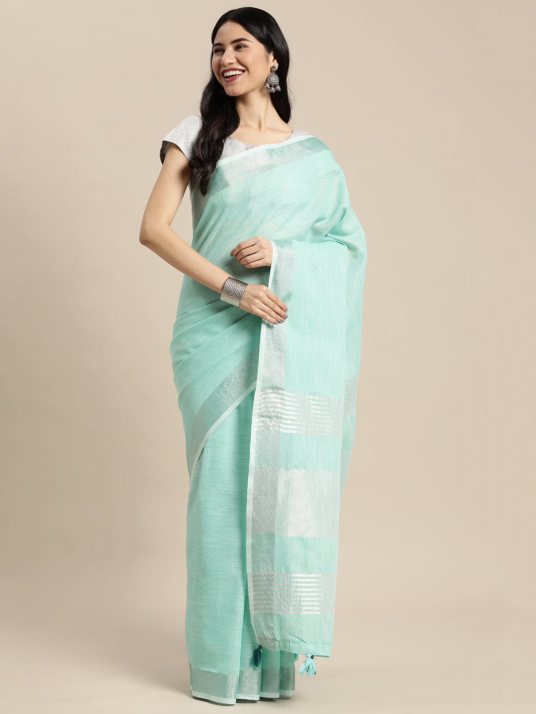 Astita Elegant Turquoise Woven Linen Saree with Contrast Zari Border & Tassels – Soft & Breathable Party Wear