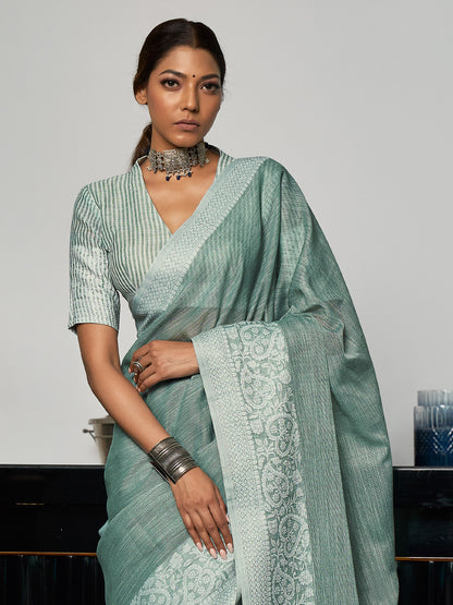 Elegant Sea Green Woven Linen Saree with Contrast Zari Border & Tassels – Soft & Breathable Party Wear