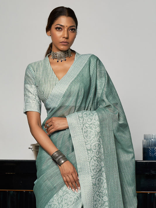 Elegant Sea Green Woven Linen Saree with Contrast Zari Border & Tassels – Soft & Breathable Party Wear
