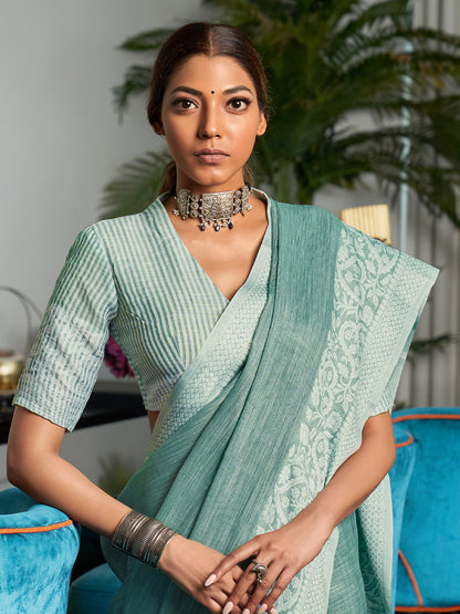 Elegant Sea Green Woven Linen Saree with Contrast Zari Border & Tassels – Soft & Breathable Party Wear