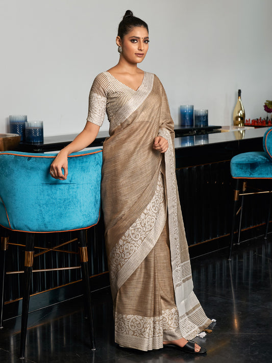 Elegant Beige Woven Linen Saree with Contrast Zari Border & Tassels – Soft & Breathable Party Wear