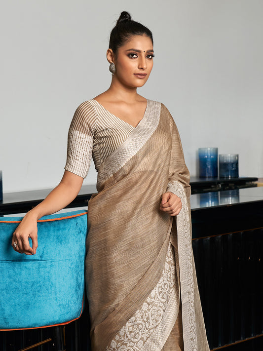 Elegant Beige Woven Linen Saree with Contrast Zari Border & Tassels – Soft & Breathable Party Wear