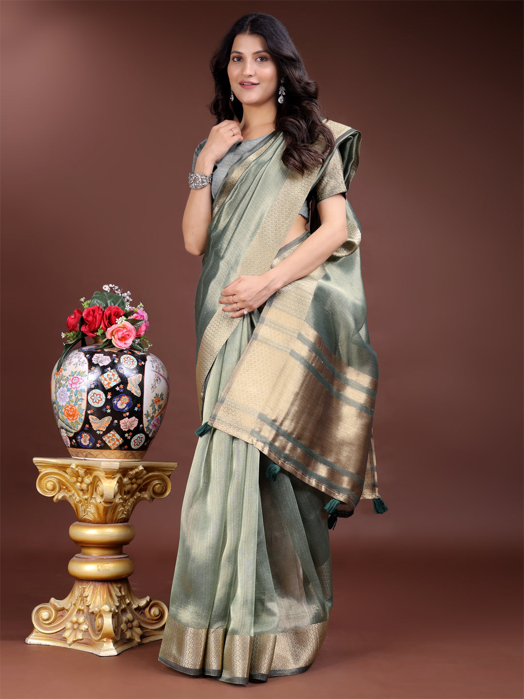Sea Green Organza Saree with Golden Zari Border – Mystique Meets Elegance