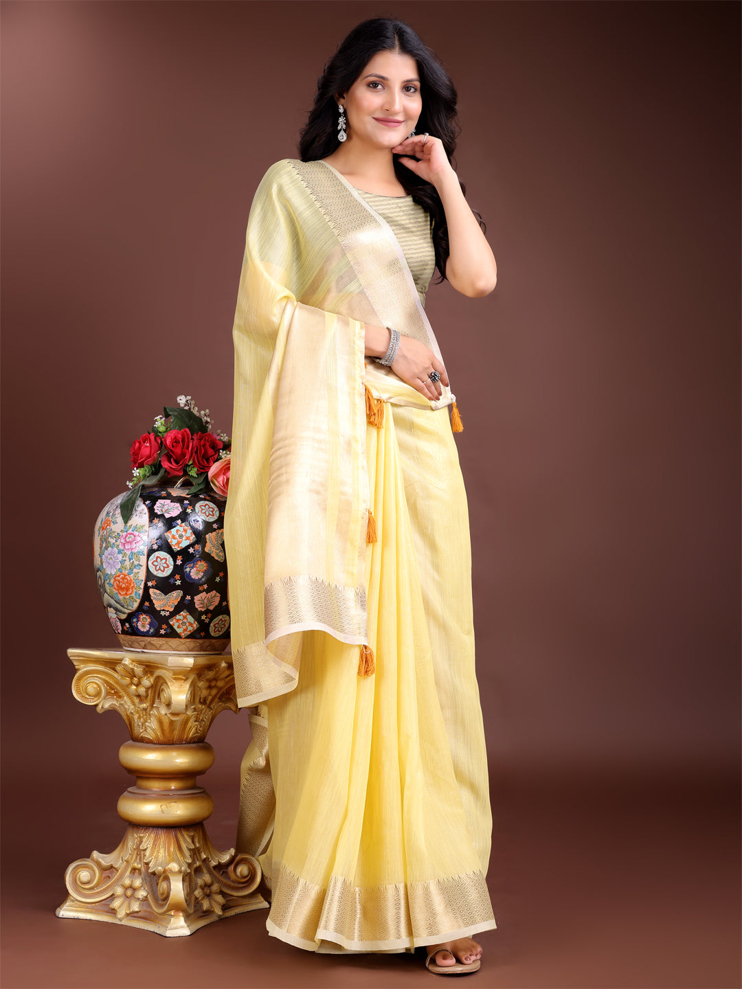 Astita Elegant Yellow Woven Linen Saree with Contrast Zari Border & Tassels – Soft & Breathable Party Wear