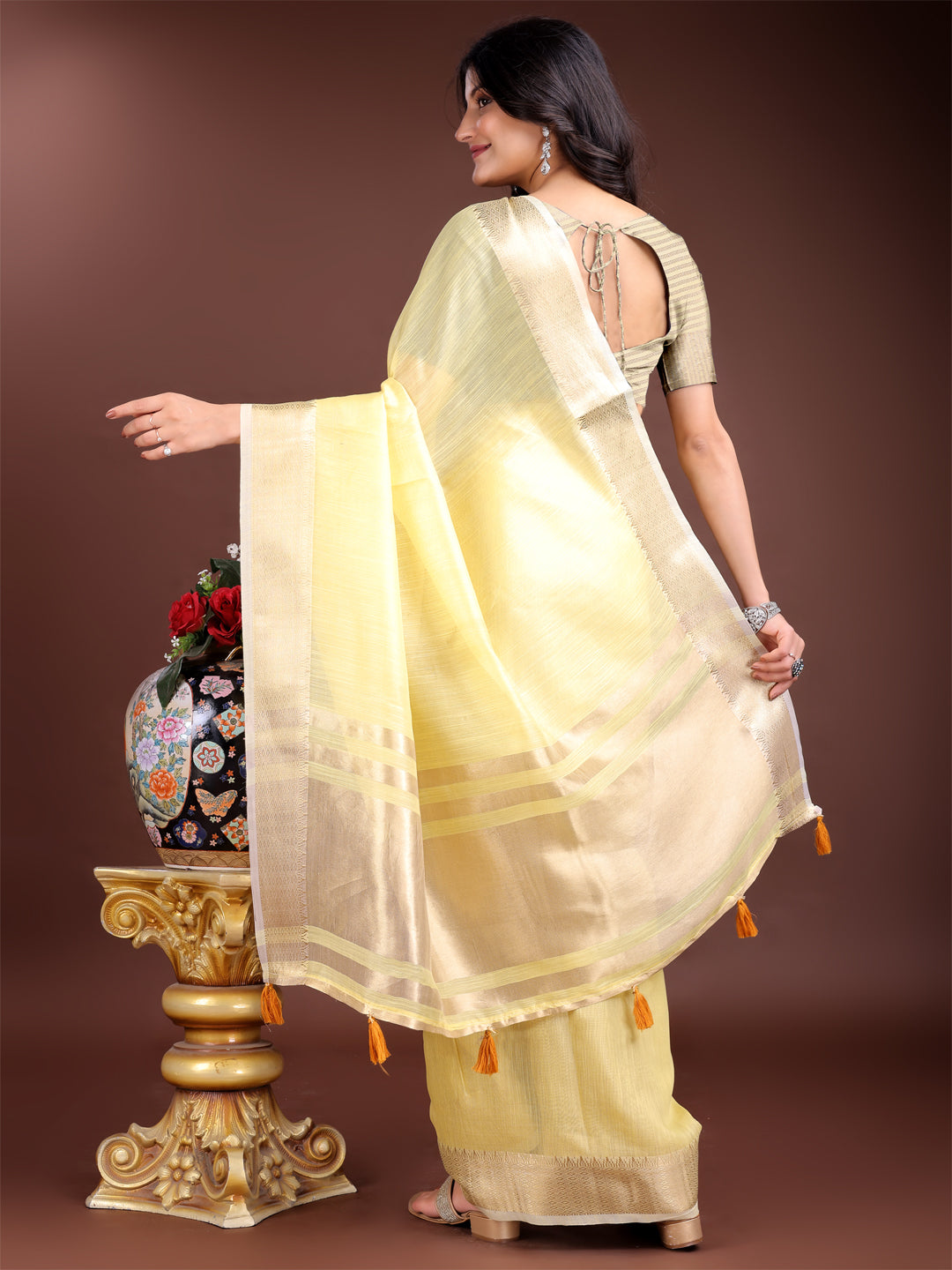 Astita Elegant Yellow Woven Linen Saree with Contrast Zari Border & Tassels – Soft & Breathable Party Wear