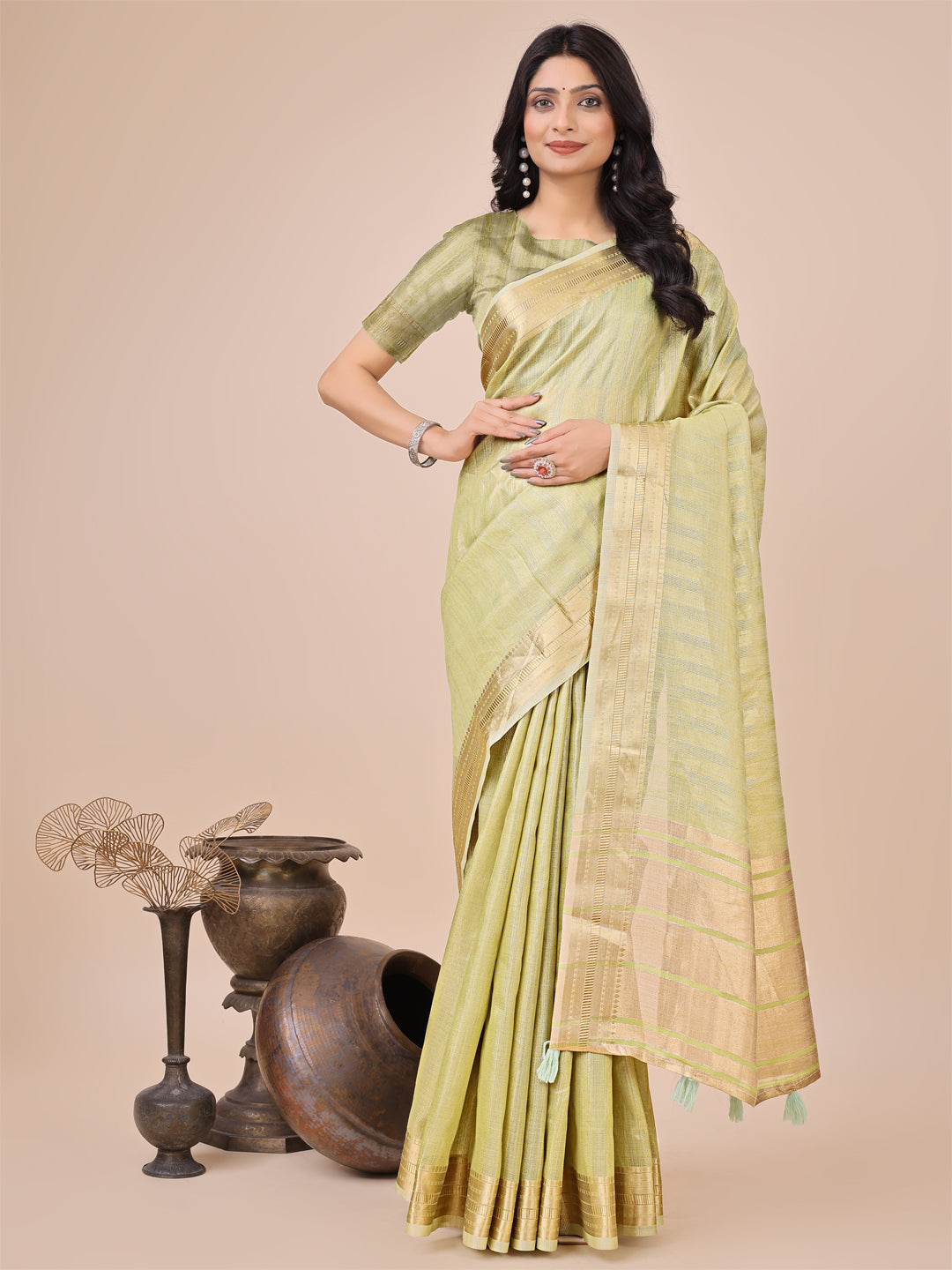 Astita Elegant Yellow Organza Saree with Zari Border & Tassel Pallu – Lightweight Ethnic Wear for Festive & Wedding Occasions