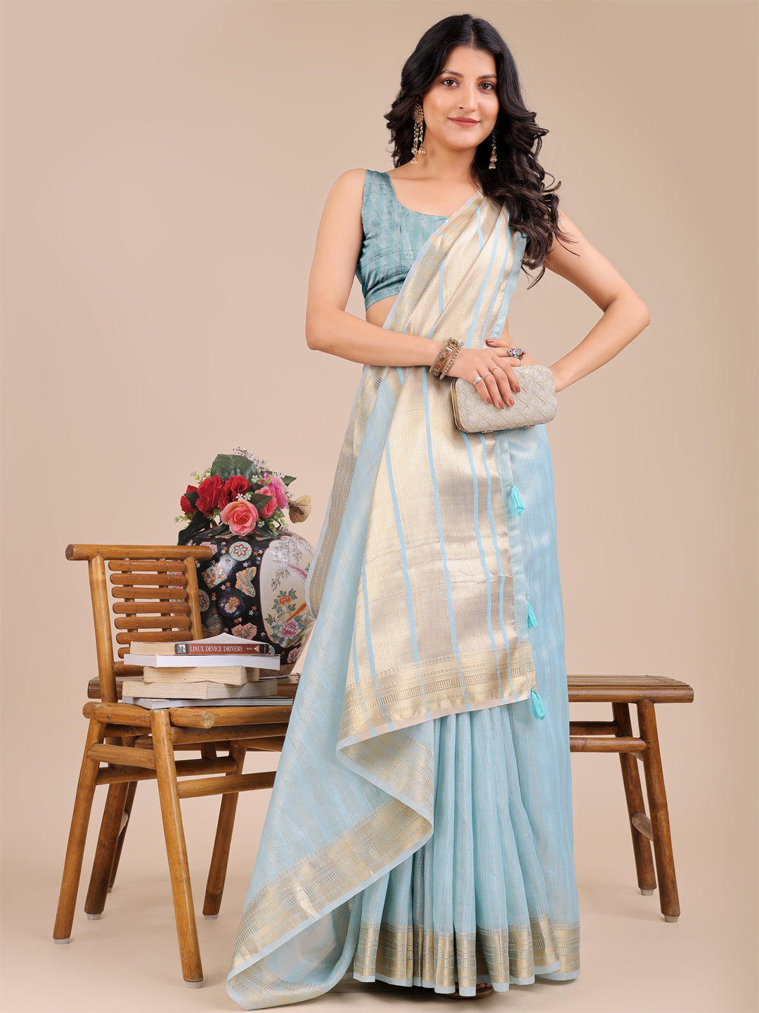Astita Elegant Sky Blue Organza Saree with Zari Border & Tassel Pallu – Lightweight Ethnic Wear for Festive & Wedding Occasions