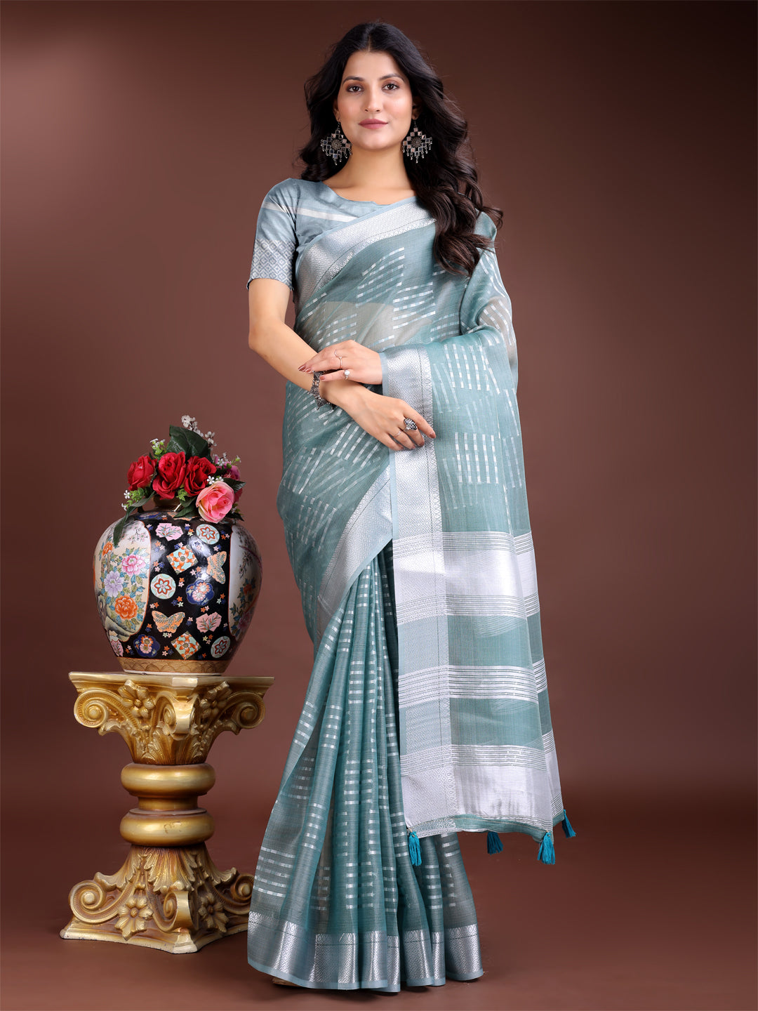 Astita Sea Green Organza Saree with Silver Zari Border & Pallu Tassels – Elegant Traditional Saree for Women